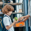 School boy with name labelled lunch box