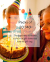 Girl and friends at birthday party with birthday cake